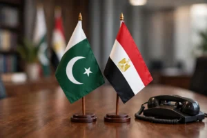 اے آئی سے بنی تصویر — میز پر پاکستان اور مصر کے جھنڈے اور ٹیلی فون (اصل شخصیات کی شباہت نہیں)
